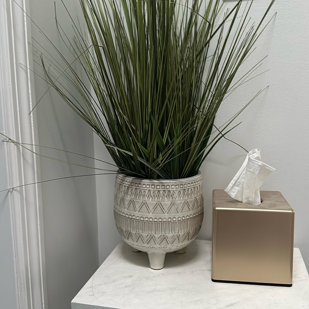 Decorative sea grass plant with boho ceramic vase